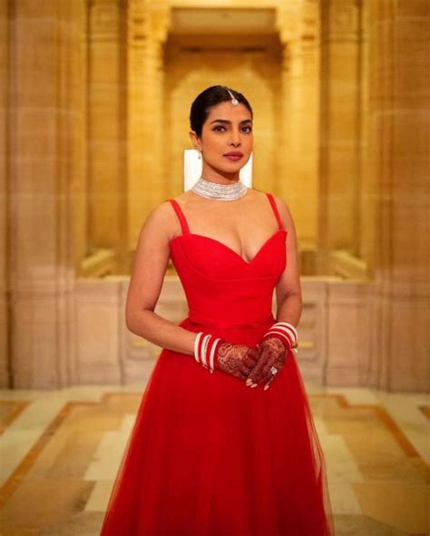 dior red sleeveless dress|priyanka chopra red dior dress.